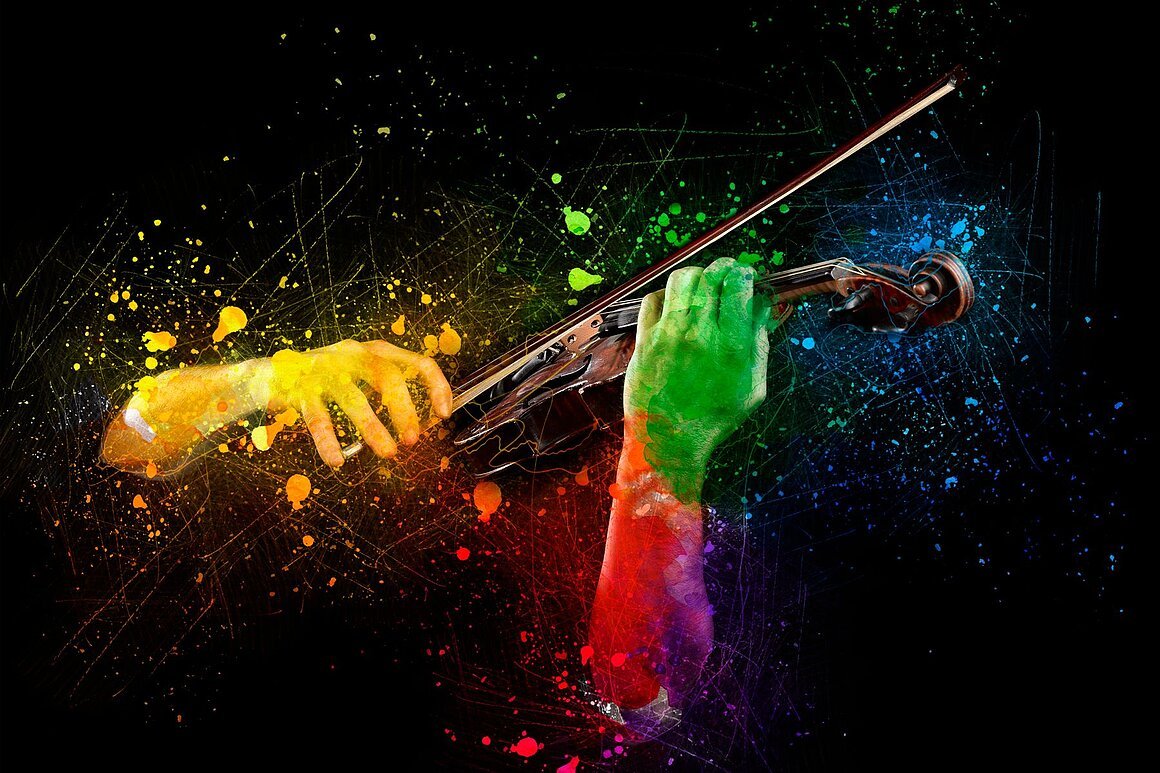 Hands playing  wooden violin on colored background